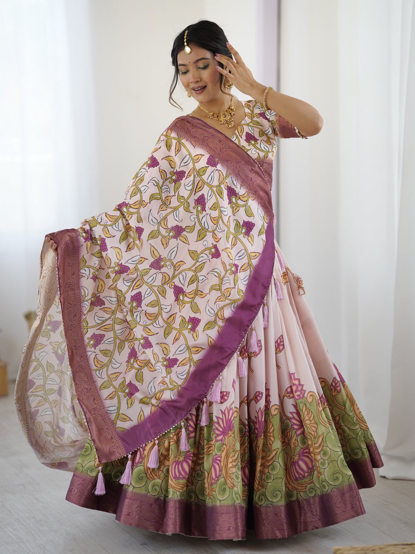 Pastel Pink Kalamkari Silk Lehenga with Tassel Dupatta & Zari Border – Festive & Wedding Wear