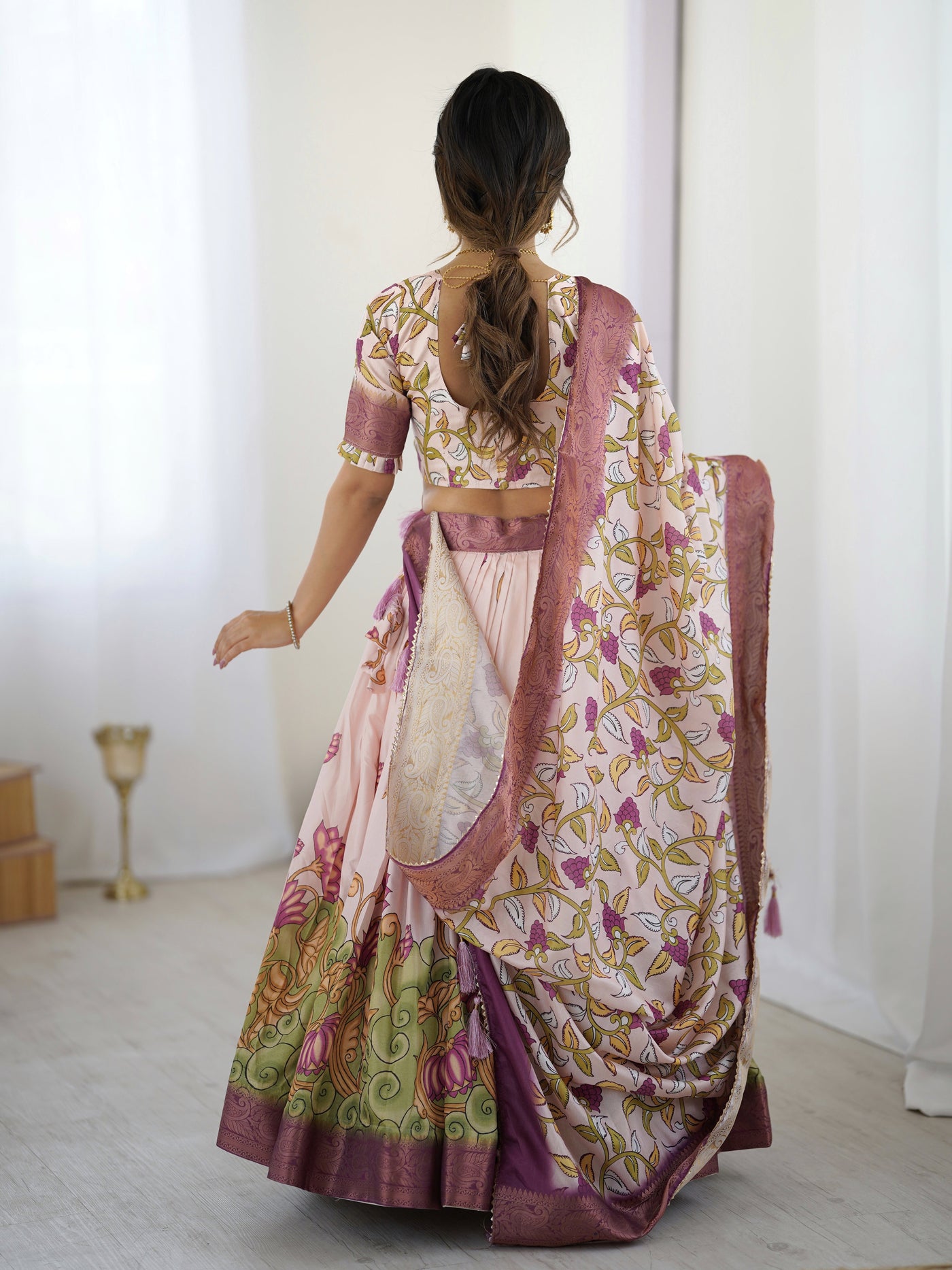 Pastel Pink Kalamkari Silk Lehenga with Tassel Dupatta & Zari Border – Festive & Wedding Wear