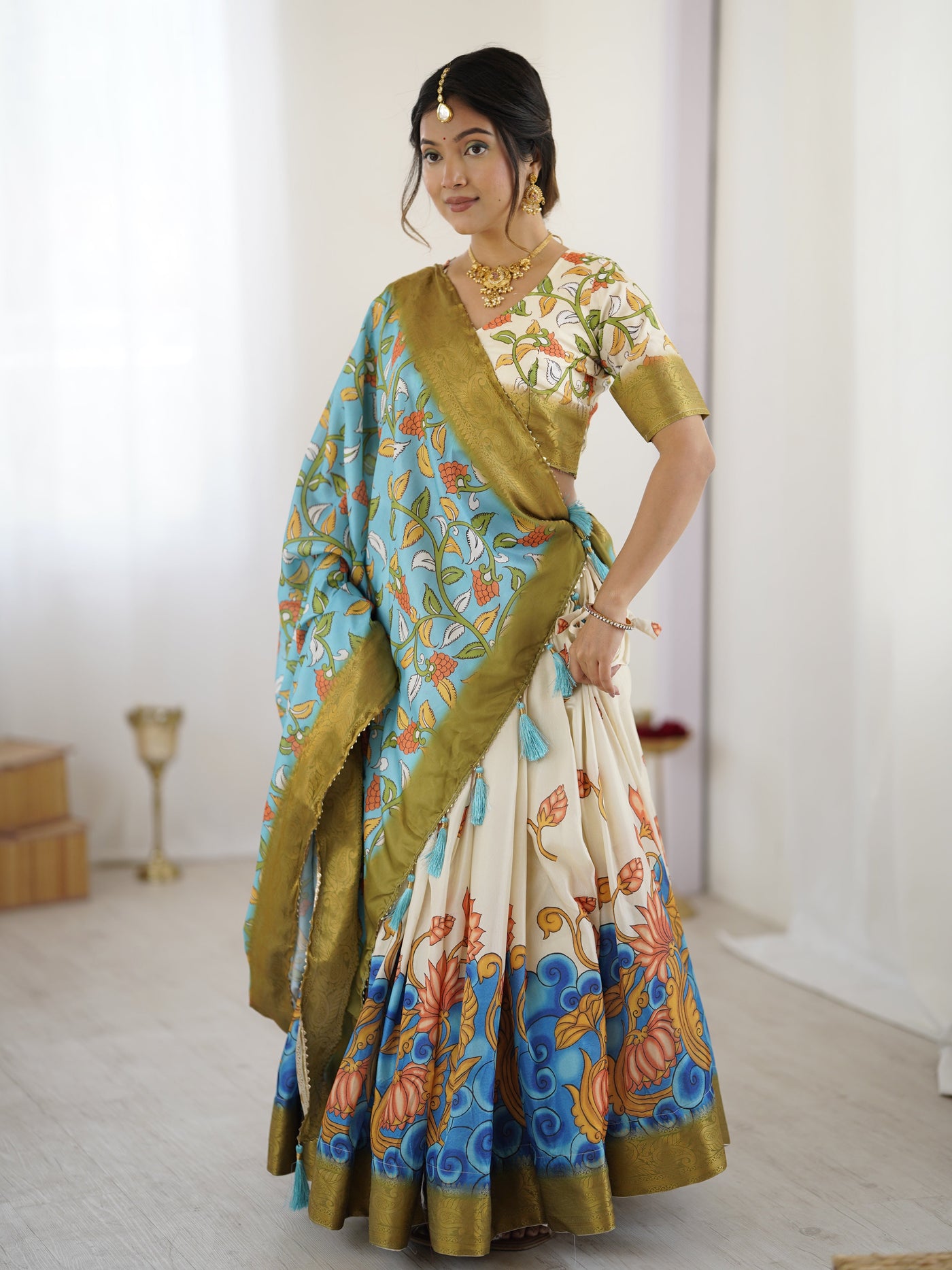 Off-White & Blue Kalamkari Silk Lehenga with Olive Zari Border & Tassel Dupatta – Festive & Wedding Wear