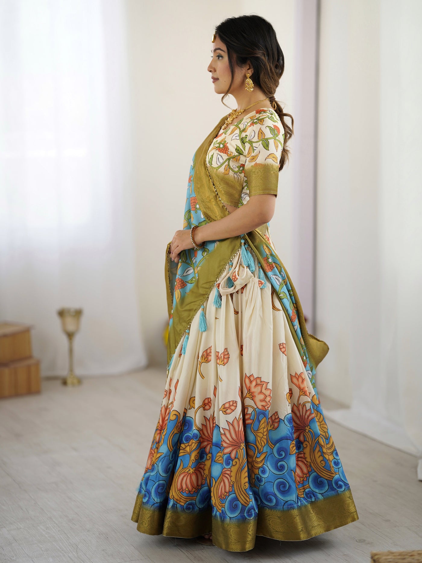 Off-White & Blue Kalamkari Silk Lehenga with Olive Zari Border & Tassel Dupatta – Festive & Wedding Wear