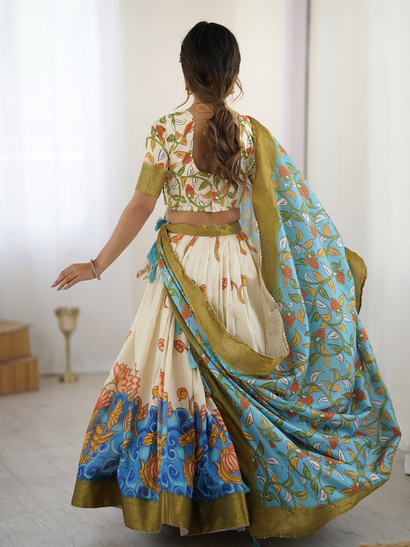 Off-White & Blue Kalamkari Silk Lehenga with Olive Zari Border & Tassel Dupatta – Festive & Wedding Wear