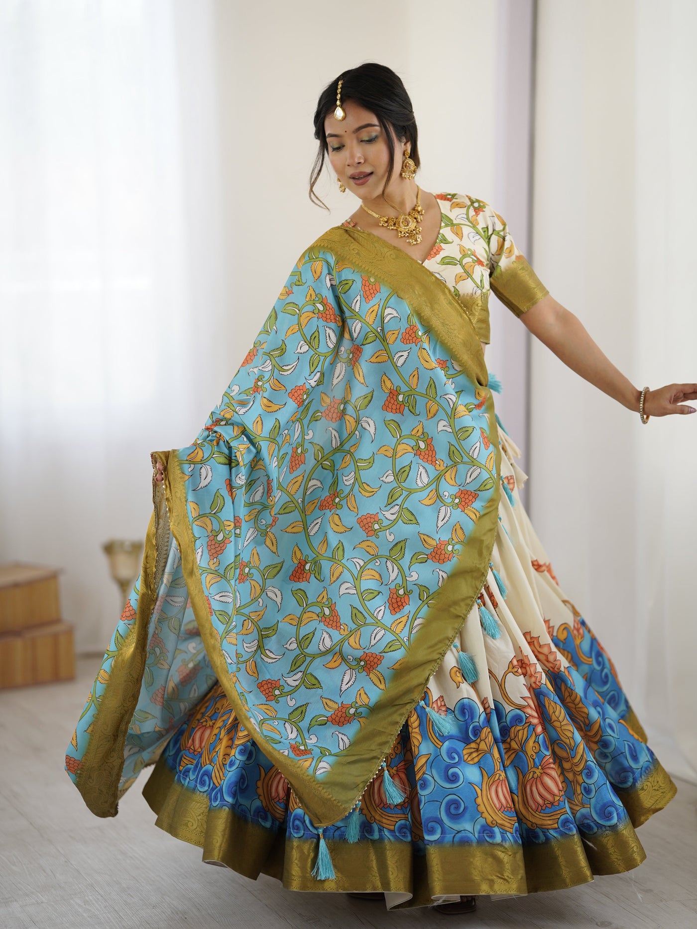 Off-White & Blue Kalamkari Silk Lehenga with Olive Zari Border & Tassel Dupatta – Festive & Wedding Wear