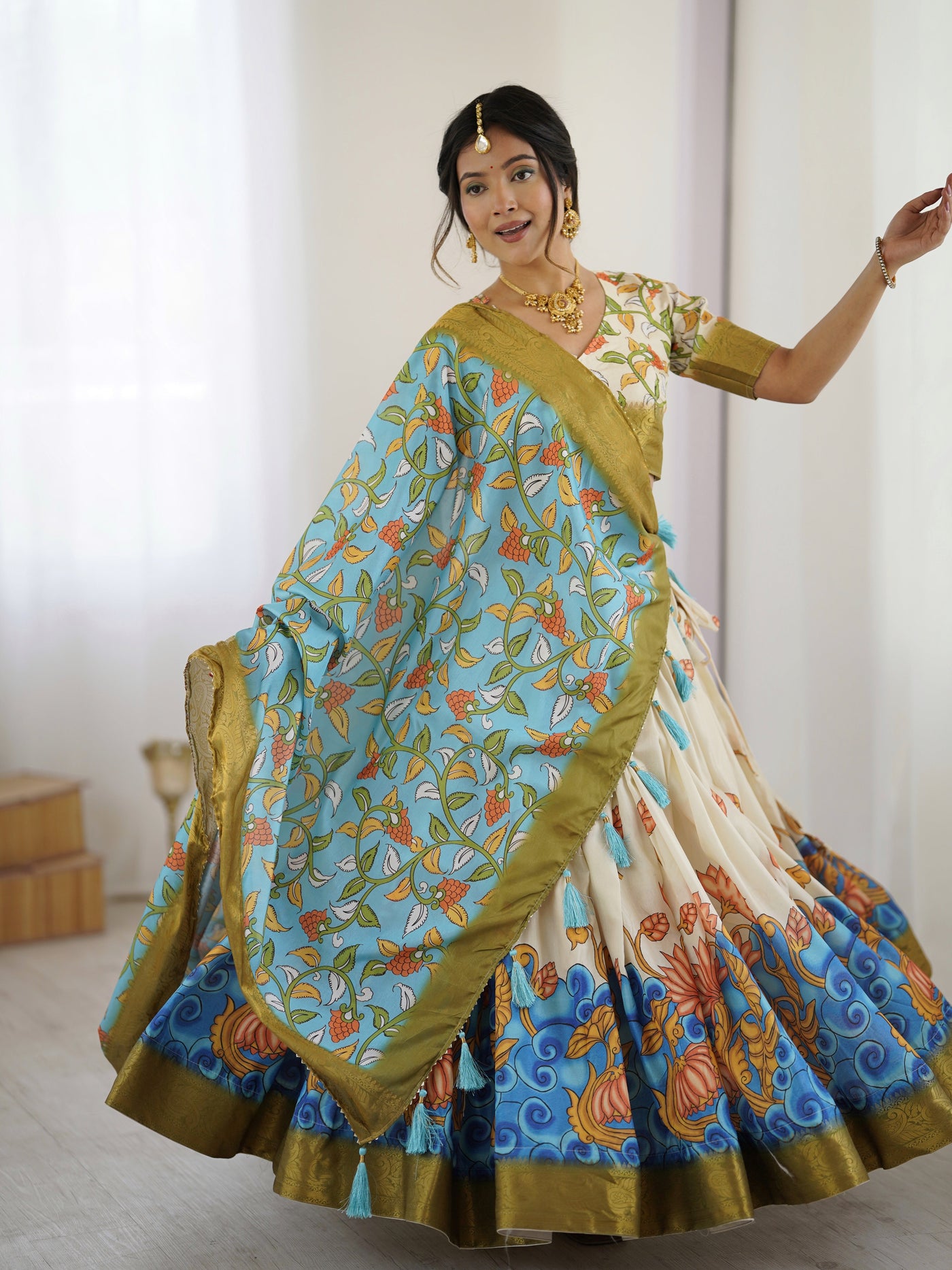 Off-White & Blue Kalamkari Silk Lehenga with Olive Zari Border & Tassel Dupatta – Festive & Wedding Wear