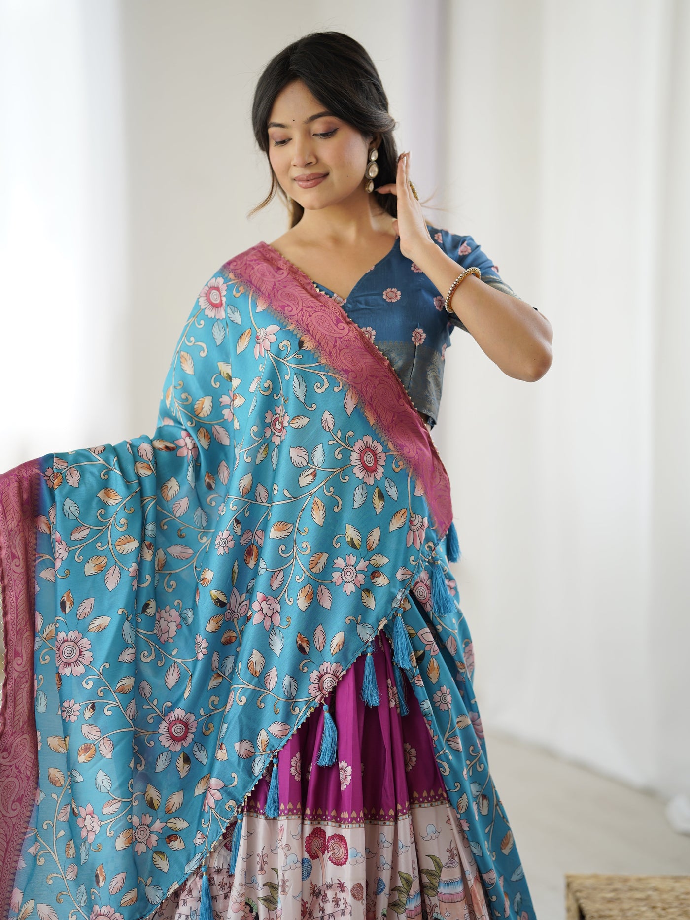 Peacock Blue Kalamkari Lehenga with Divine Print and Floral Embroidered Dupatta