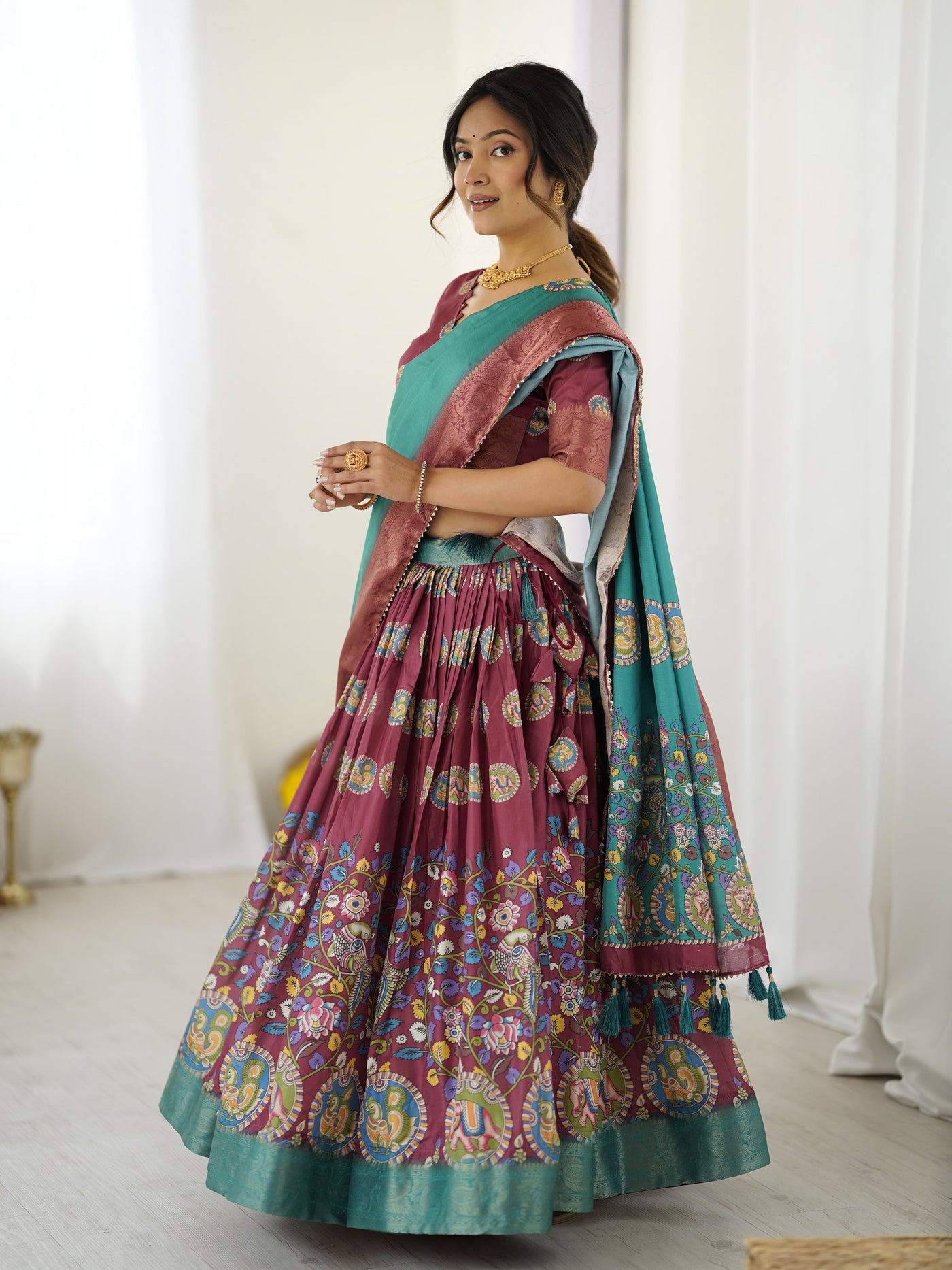 Wine & Teal Kalamkari Tussar Silk Lehenga with Zari Border & Tassel Dupatta – Festive & Wedding Wear