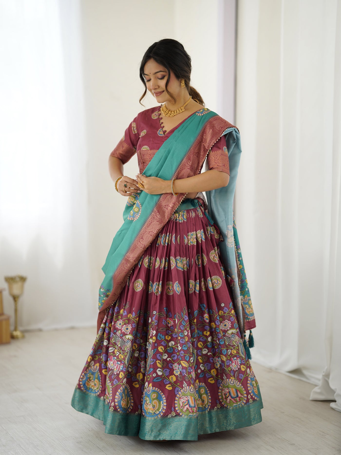 Wine & Teal Kalamkari Tussar Silk Lehenga with Zari Border & Tassel Dupatta – Festive & Wedding Wear