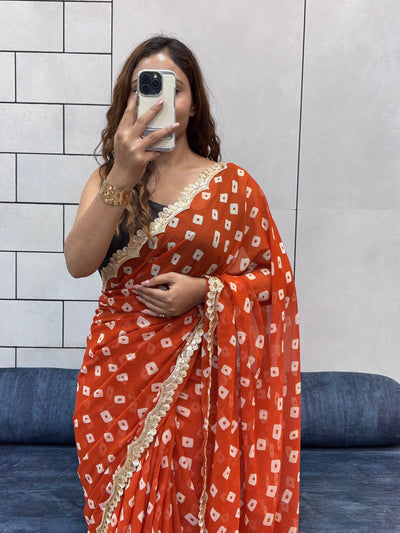 Vibrant Orange Bandhani Georgette Saree with embroidery  Lace Border & Running Blouse