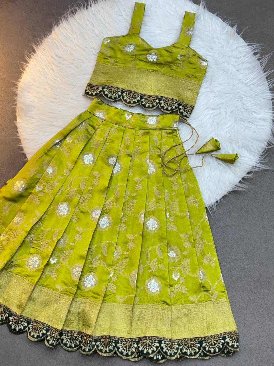Olive Green Silk Kids Lehenga Choli with Sleeveless Blouse and Zari Embroidery Lace Border  – Festive Wear
