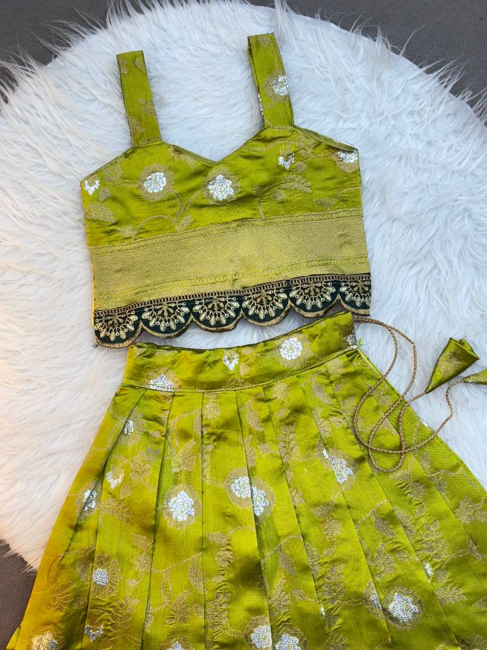 Olive Green Silk Kids Lehenga Choli with Sleeveless Blouse and Zari Embroidery Lace Border  – Festive Wear