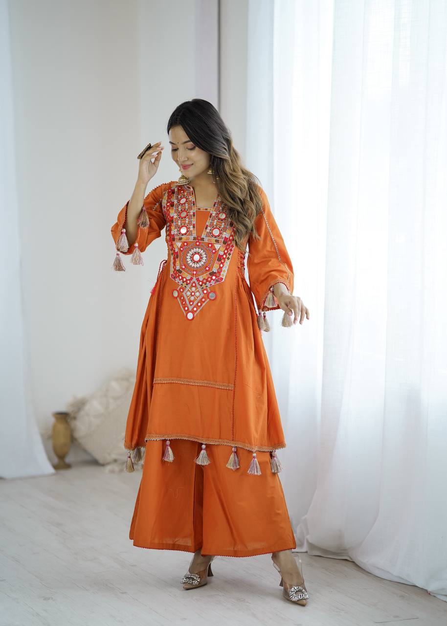 Hand-Embroidered Designer Peplum & Bell Bottom Set with Real Mirror Work Orange Kurta Set with Pink Tassels – Ethnic Festive Wear for Women