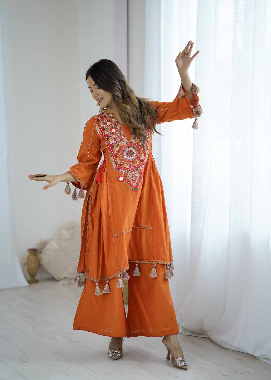 Hand-Embroidered Designer Peplum & Bell Bottom Set with Real Mirror Work Orange Kurta Set with Pink Tassels – Ethnic Festive Wear for Women