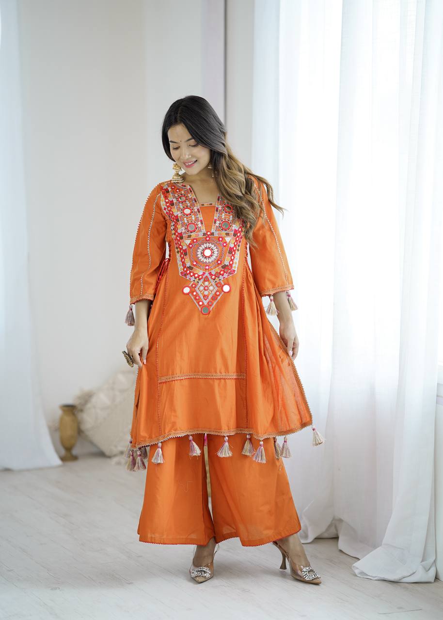 Hand-Embroidered Designer Peplum & Bell Bottom Set with Real Mirror Work Orange Kurta Set with Pink Tassels – Ethnic Festive Wear for Women