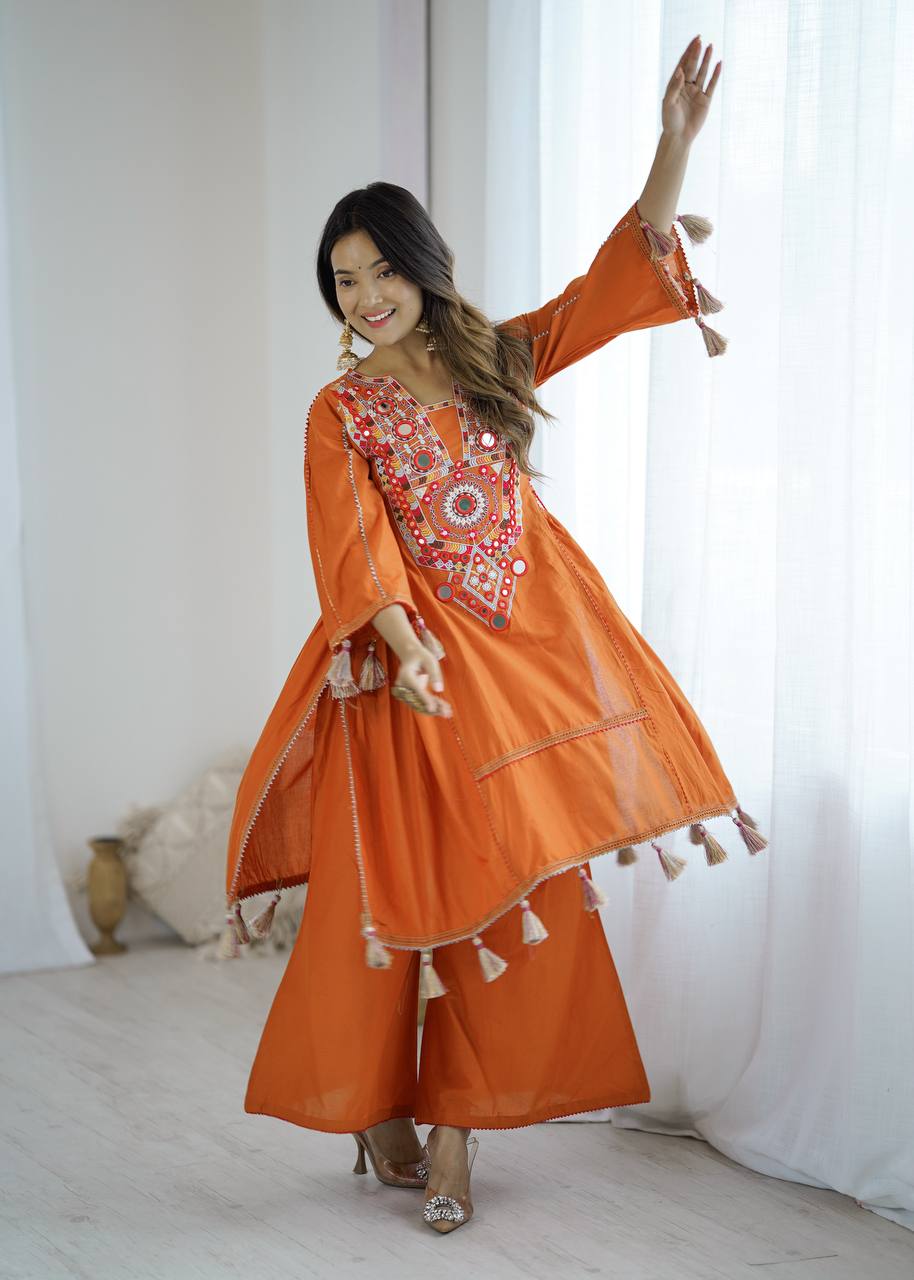 Hand-Embroidered Designer Peplum & Bell Bottom Set with Real Mirror Work Orange Kurta Set with Pink Tassels – Ethnic Festive Wear for Women