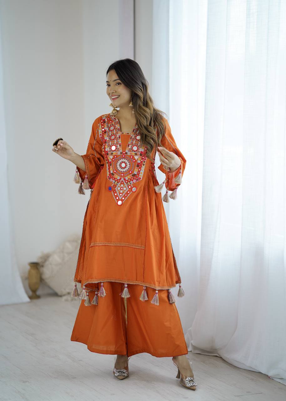 Hand-Embroidered Designer Peplum & Bell Bottom Set with Real Mirror Work Orange Kurta Set with Pink Tassels – Ethnic Festive Wear for Women