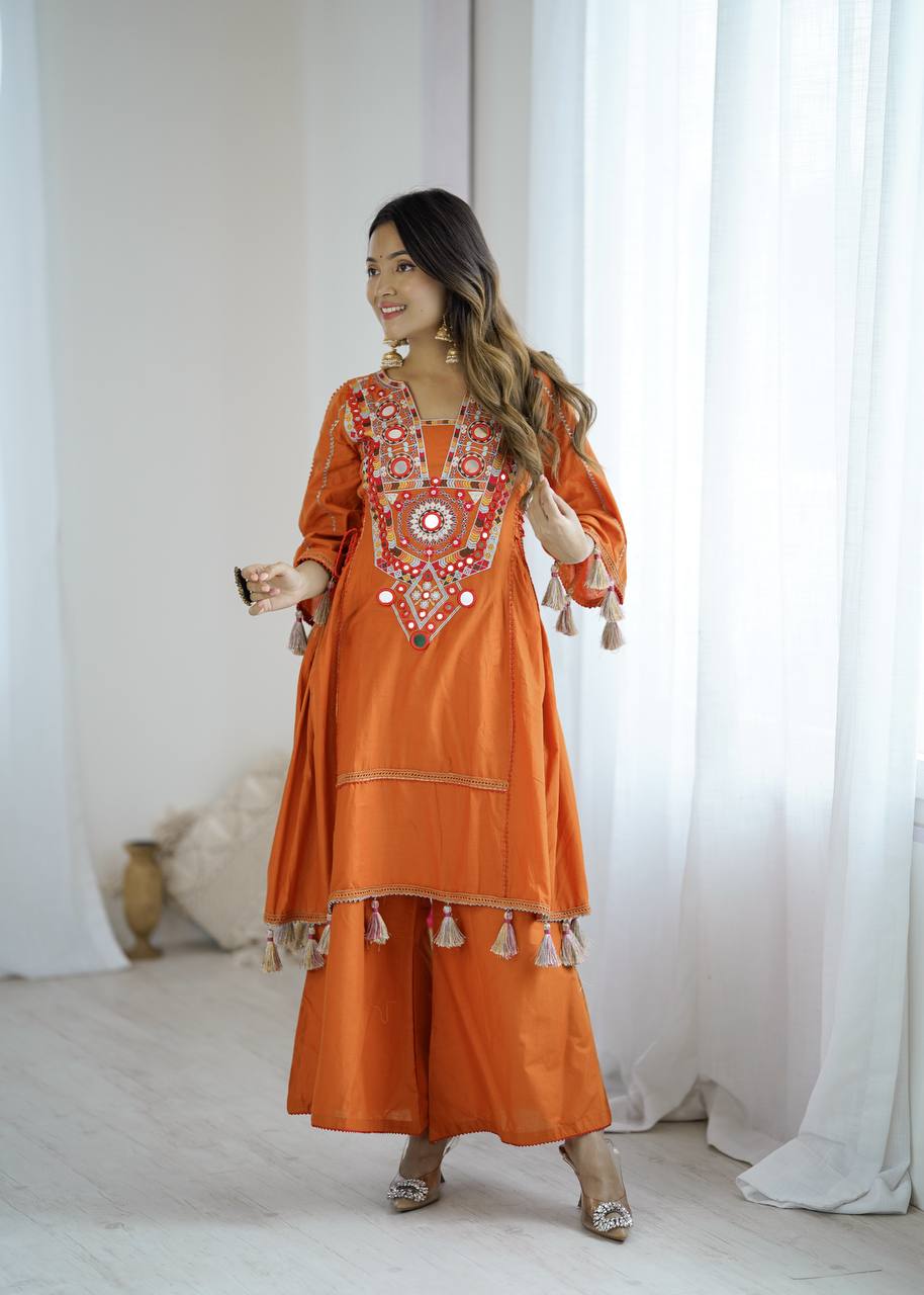 Hand-Embroidered Designer Peplum & Bell Bottom Set with Real Mirror Work Orange Kurta Set with Pink Tassels – Ethnic Festive Wear for Women