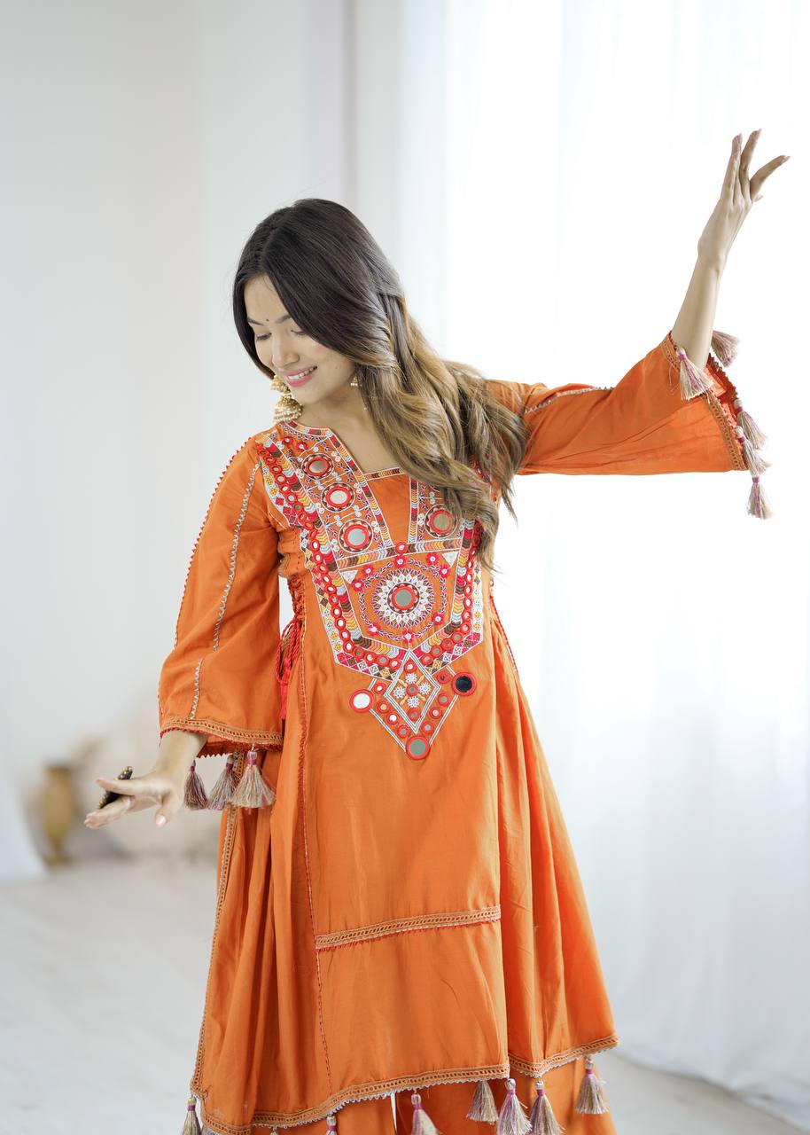 Hand-Embroidered Designer Peplum & Bell Bottom Set with Real Mirror Work Orange Kurta Set with Pink Tassels – Ethnic Festive Wear for Women