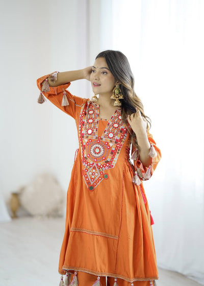 Hand-Embroidered Designer Peplum & Bell Bottom Set with Real Mirror Work Orange Kurta Set with Pink Tassels – Ethnic Festive Wear for Women