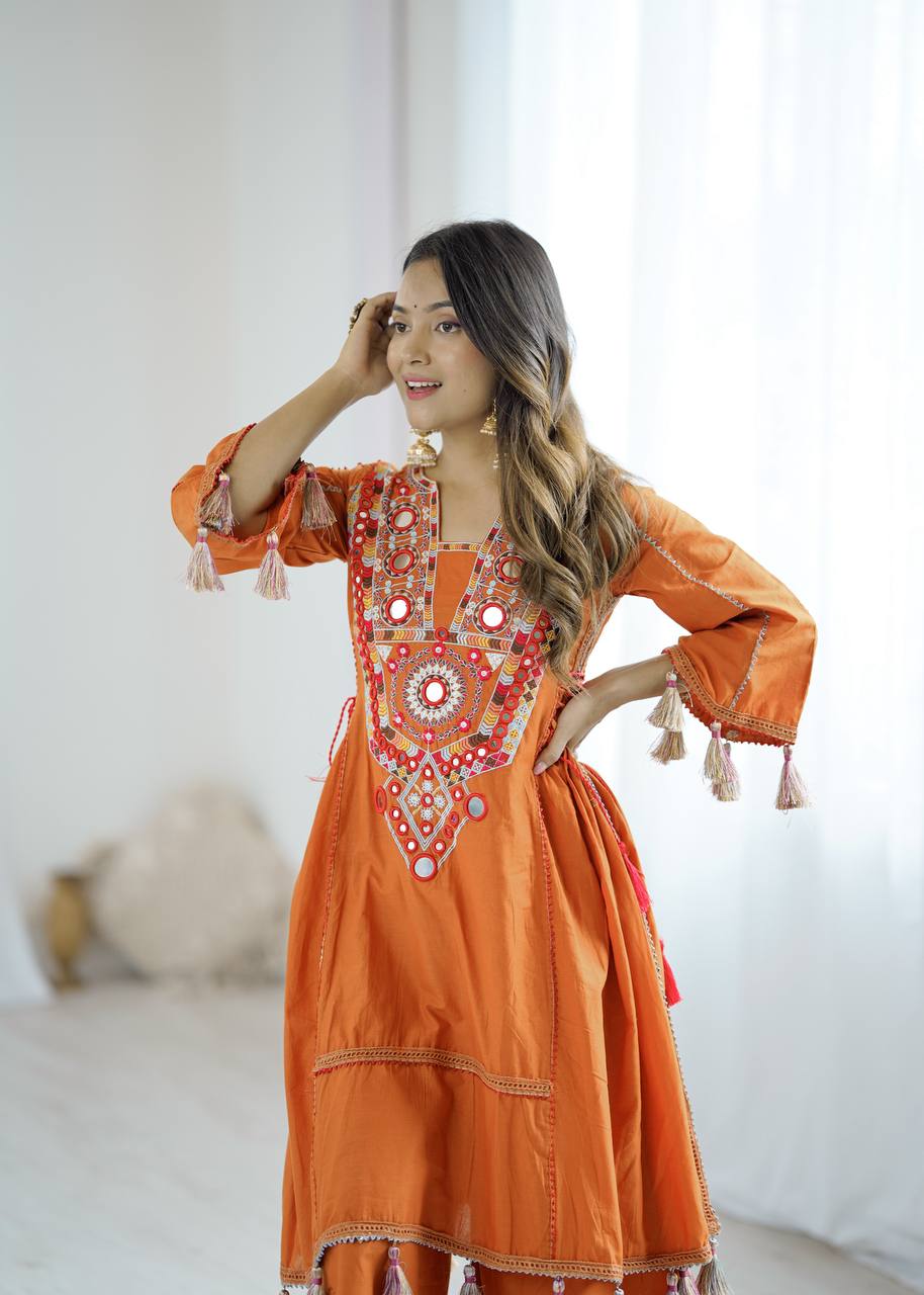 Hand-Embroidered Designer Peplum & Bell Bottom Set with Real Mirror Work Orange Kurta Set with Pink Tassels – Ethnic Festive Wear for Women