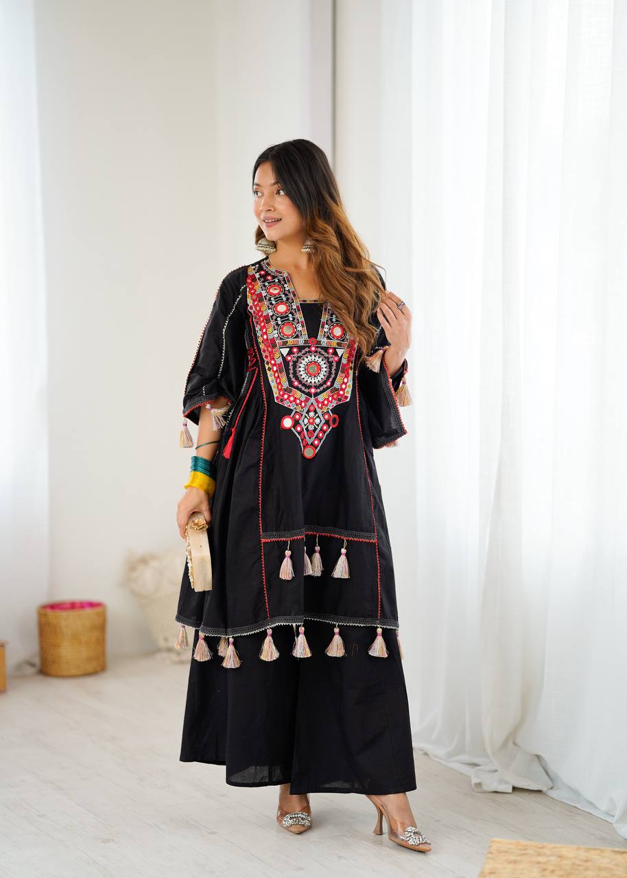 Hand-Embroidered Designer Peplum & Bell Bottom Set with Real Mirror Work Black Kurta Set with Pink Tassels – Ethnic Festive Wear for Women