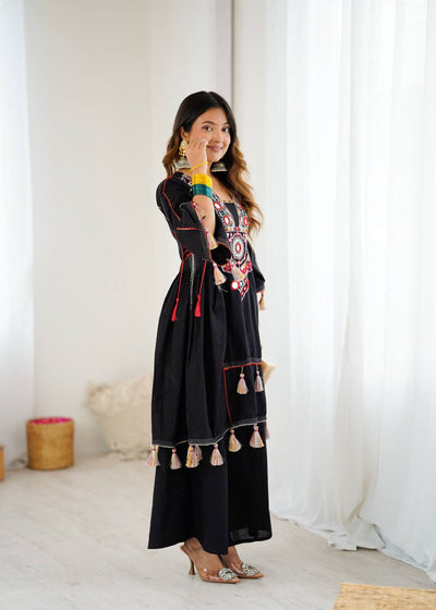 Hand-Embroidered Designer Peplum & Bell Bottom Set with Real Mirror Work Black Kurta Set with Pink Tassels – Ethnic Festive Wear for Women