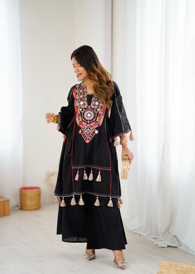Hand-Embroidered Designer Peplum & Bell Bottom Set with Real Mirror Work Black Kurta Set with Pink Tassels – Ethnic Festive Wear for Women