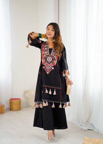Hand-Embroidered Designer Peplum & Bell Bottom Set with Real Mirror Work Black Kurta Set with Pink Tassels – Ethnic Festive Wear for Women