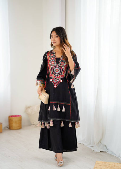 Hand-Embroidered Designer Peplum & Bell Bottom Set with Real Mirror Work Black Kurta Set with Pink Tassels – Ethnic Festive Wear for Women