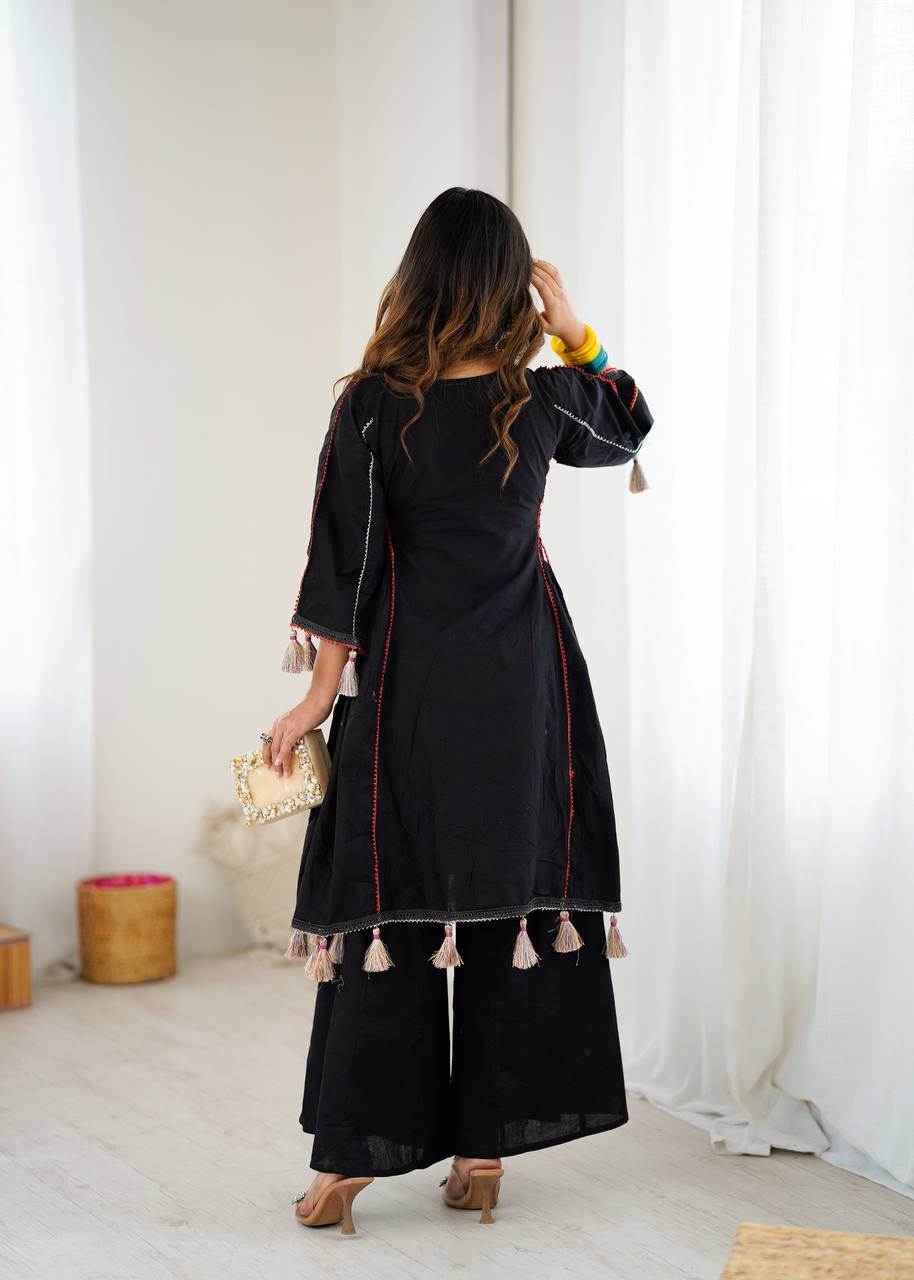 Hand-Embroidered Designer Peplum & Bell Bottom Set with Real Mirror Work Black Kurta Set with Pink Tassels – Ethnic Festive Wear for Women