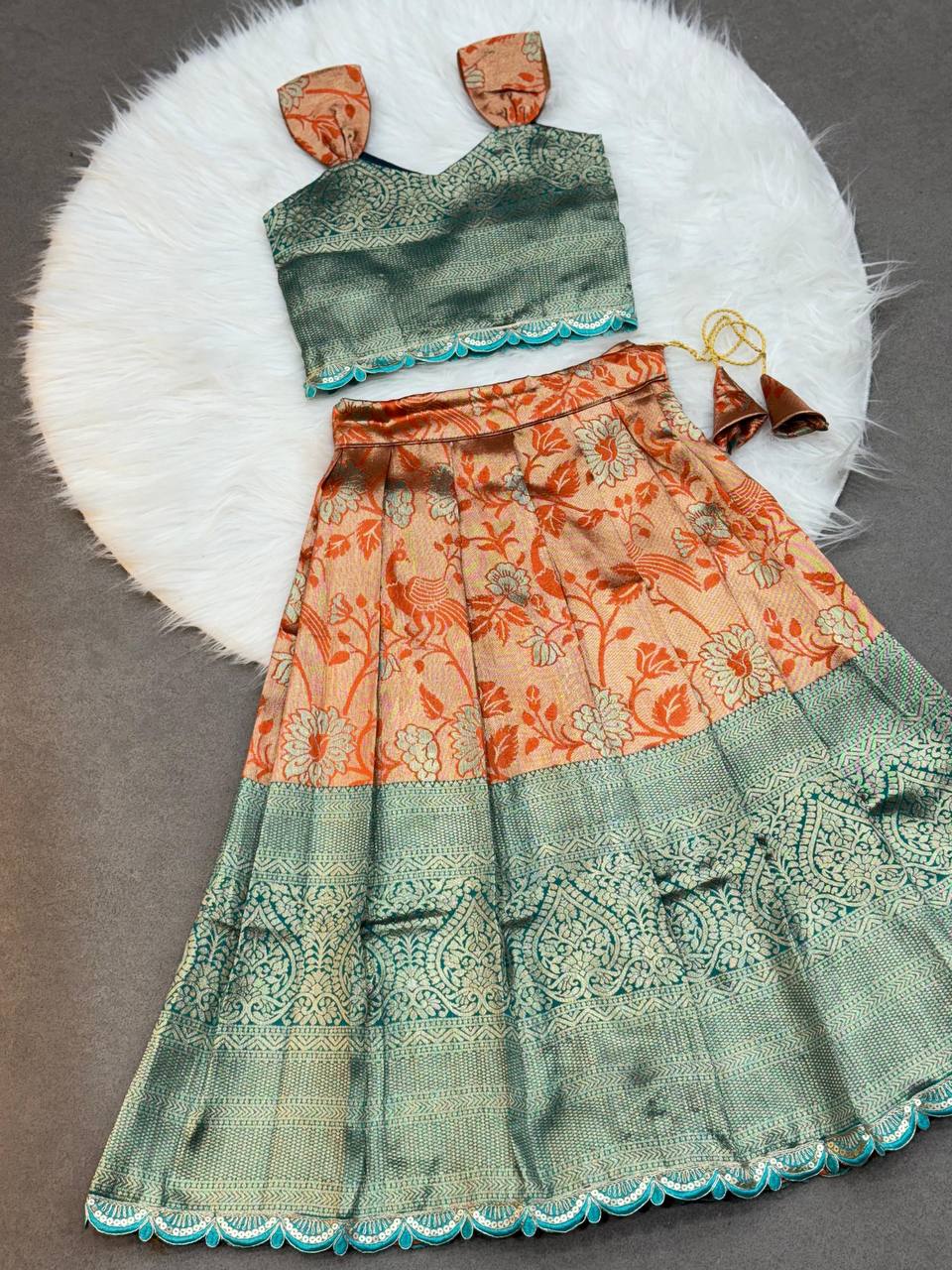 Peacock Green Zari Blouse with Rust-Orange Puff Sleeves Kids Lehenga Choli