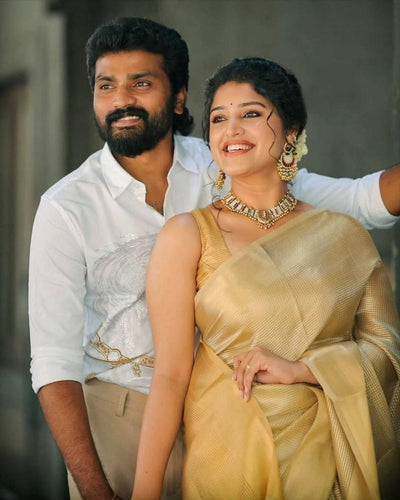 Lustrous Charm – Classic Tissue Silk Saree with a Royal Touch