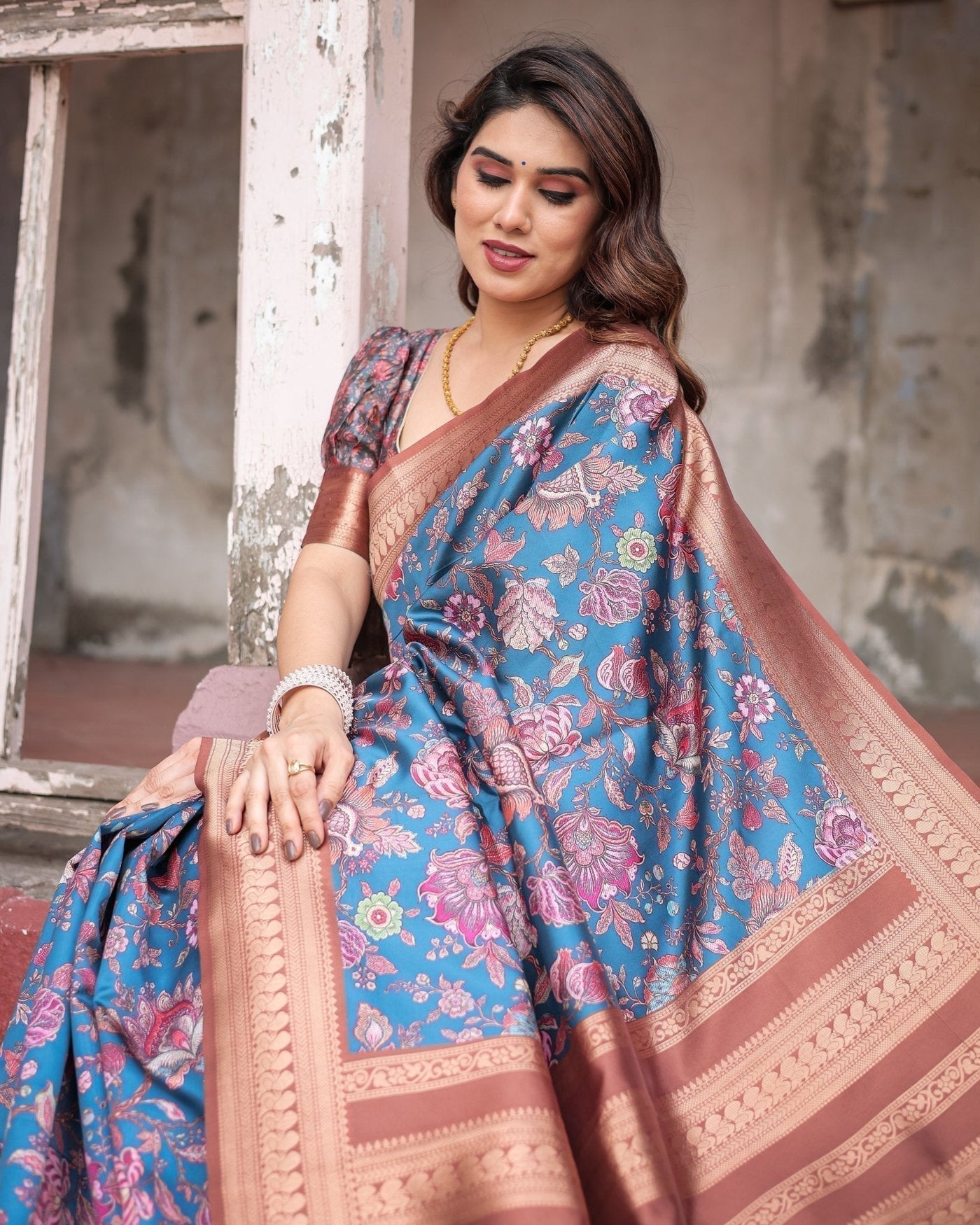 Teal Banarasi Silk Saree with Rust Zari Border and Floral Motifs
