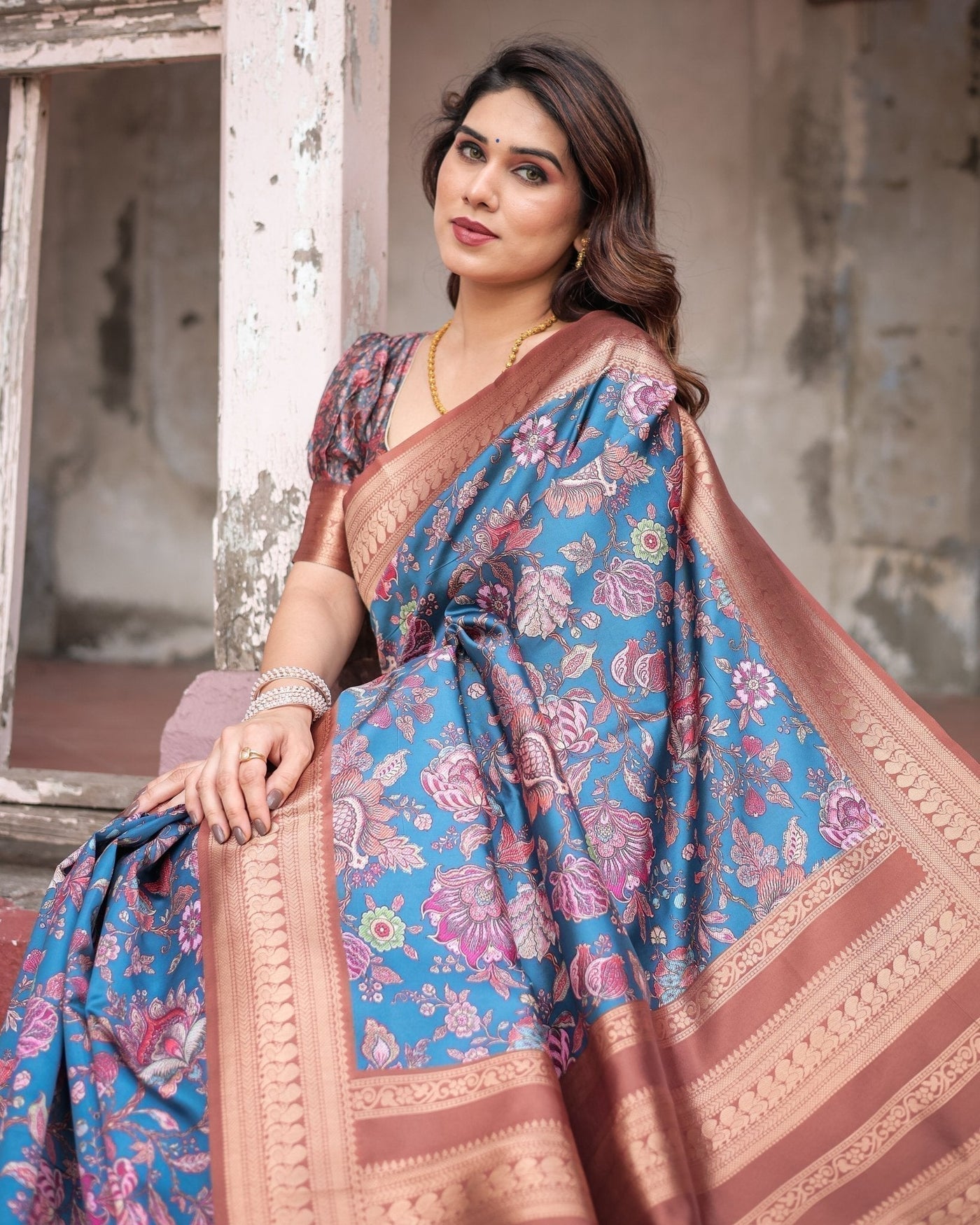 Teal Banarasi Silk Saree with Rust Zari Border and Floral Motifs