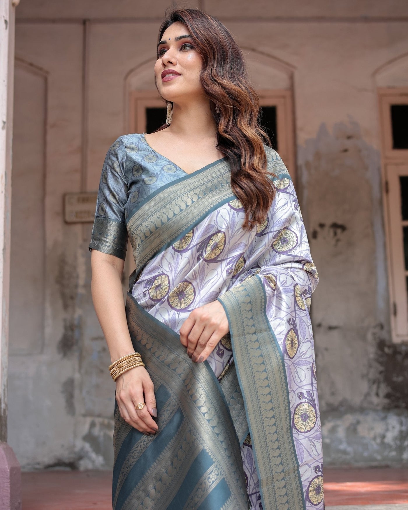 Sophisticated Lilac Banarasi Silk Saree with Floral Prints and Zari Tassel Border