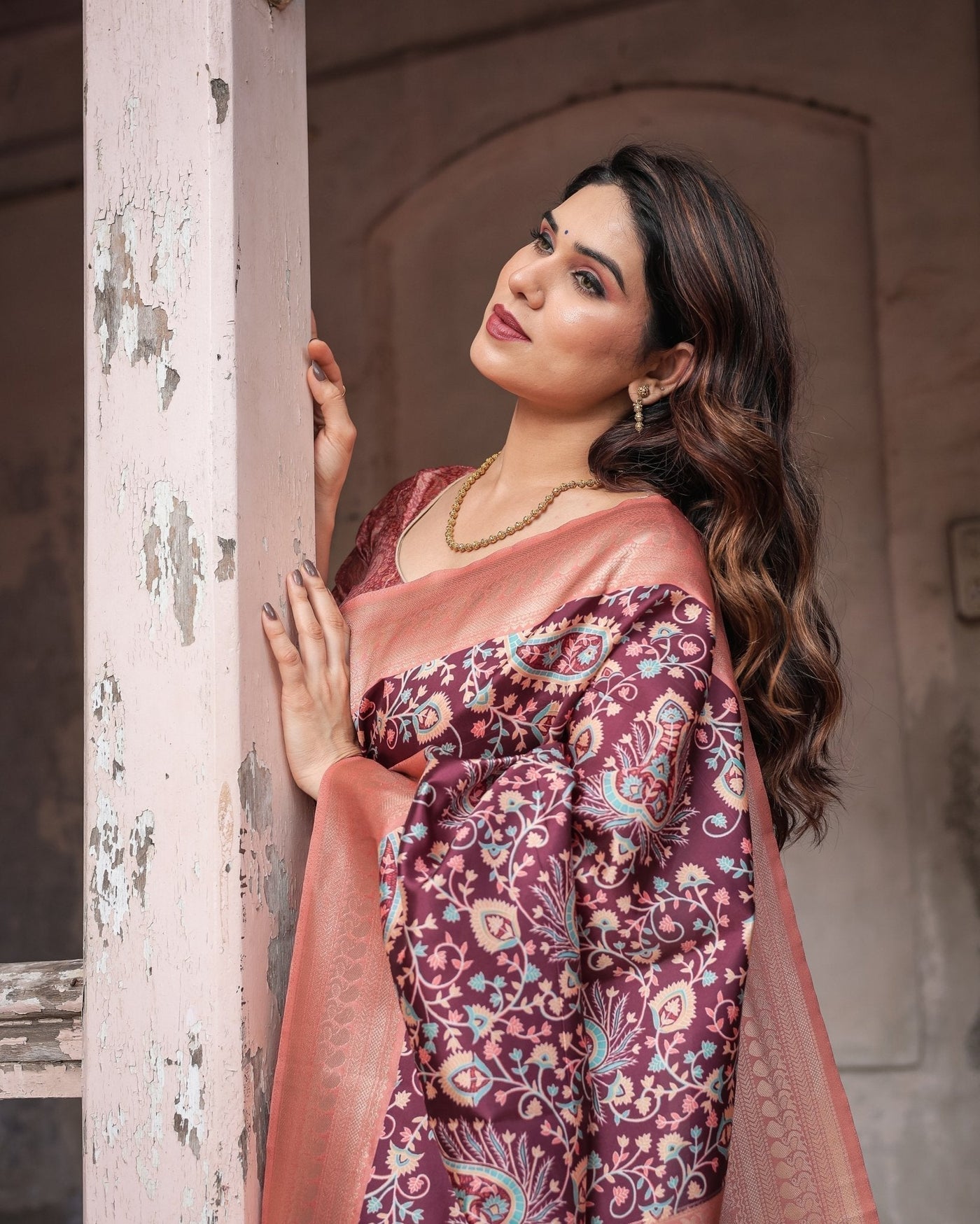 Maroon Banarasi Silk Saree with Peach Zari Border and Paisley Motifs