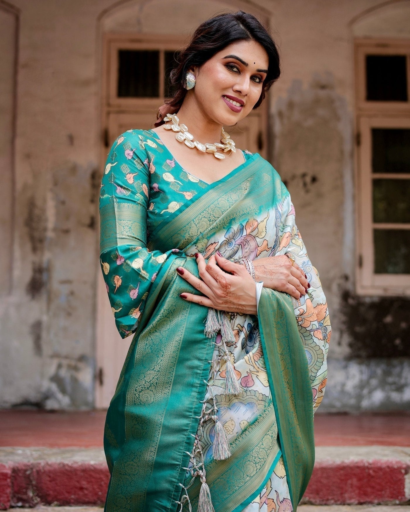 Graceful Green Banarasi Silk Saree with Vibrant Motifs and Zari Woven Pallu