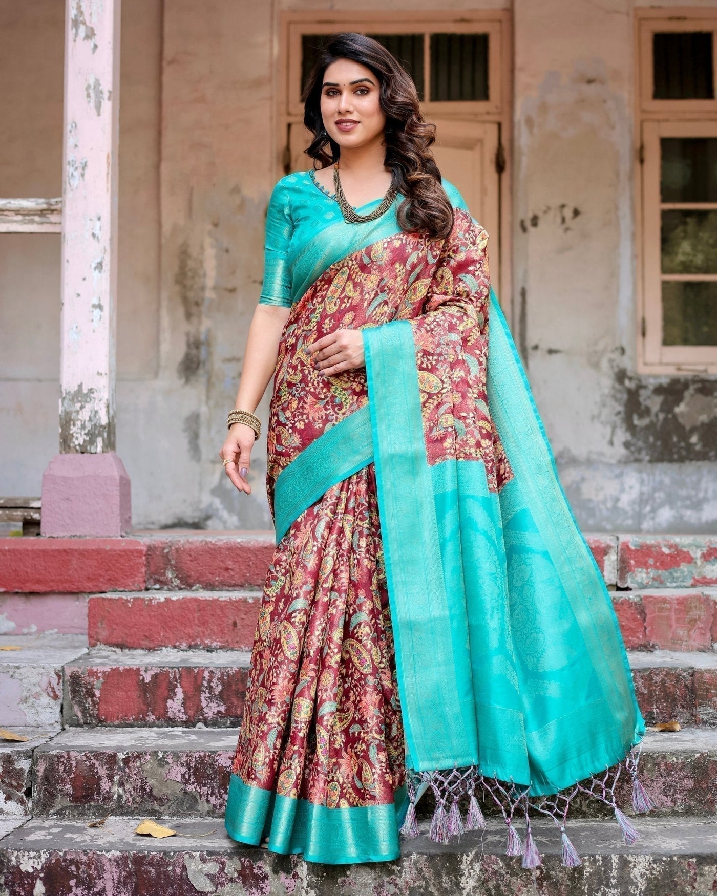 Maroon and Teal Paisley Design Banarasi Silk Saree with Zari Weave and Tassel-Embellished Pallu