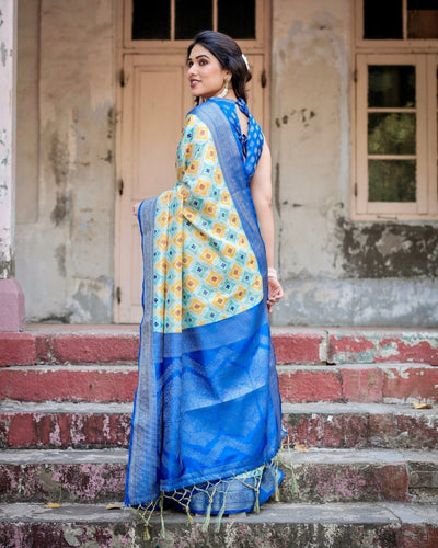 Yellow and Blue Ikat Digital Print Banarasi Silk Saree with Zari Weave and Tassel-Embellished Pallu