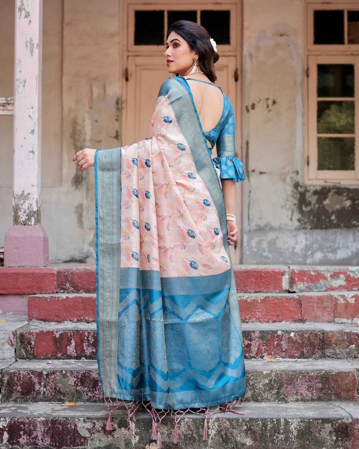 Peach and Teal Floral Digital Print Banarasi Silk Saree with Zari Weave and Tassel-Adorned Pallu
