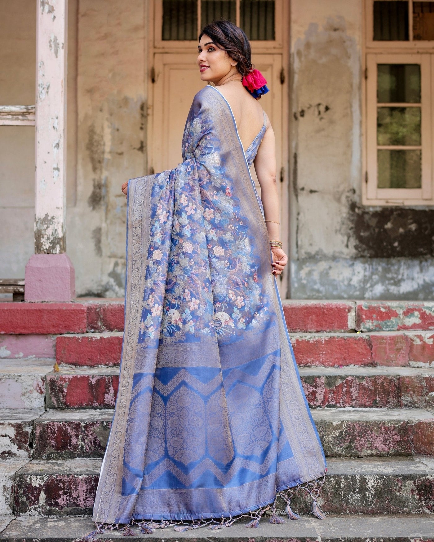 Majestic Blue Banarasi Silk Saree with Delicate Floral Zari Work and Tassel-Embellished Pallu