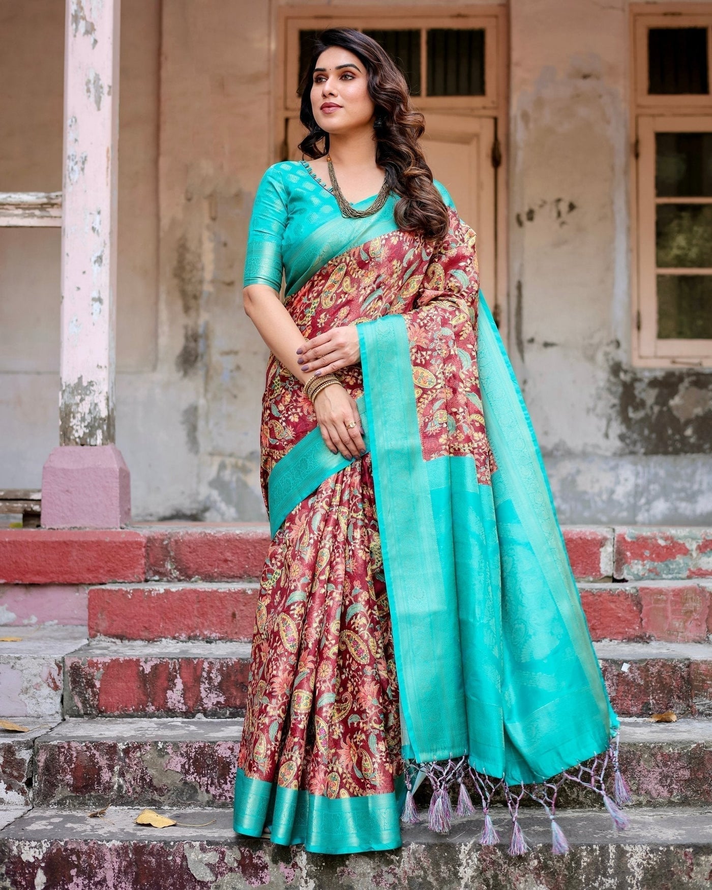 Maroon and Teal Paisley Design Banarasi Silk Saree with Zari Weave and Tassel-Embellished Pallu