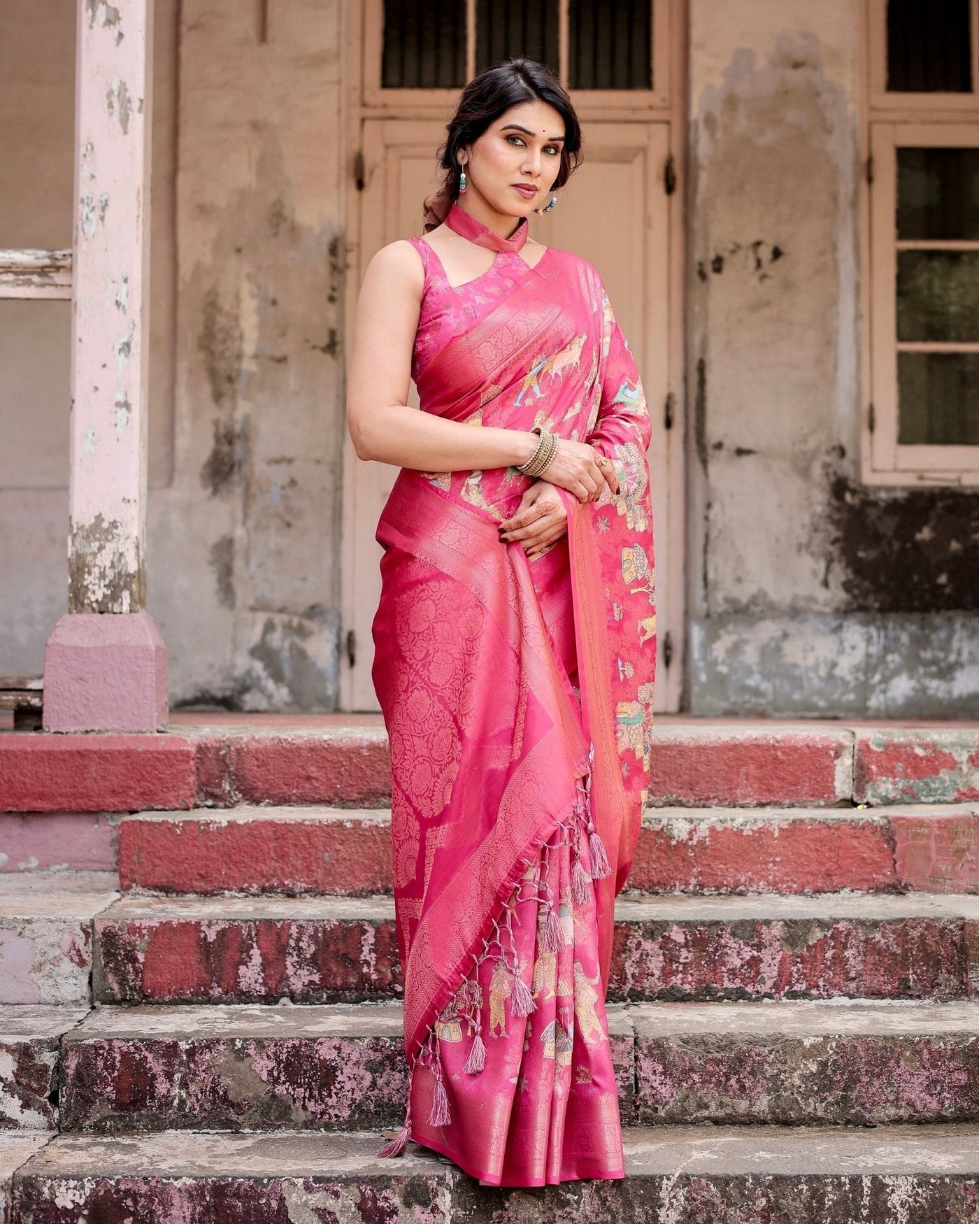Regal Pink Banarasi Silk Saree with Zari Weave and Intricate Tassels