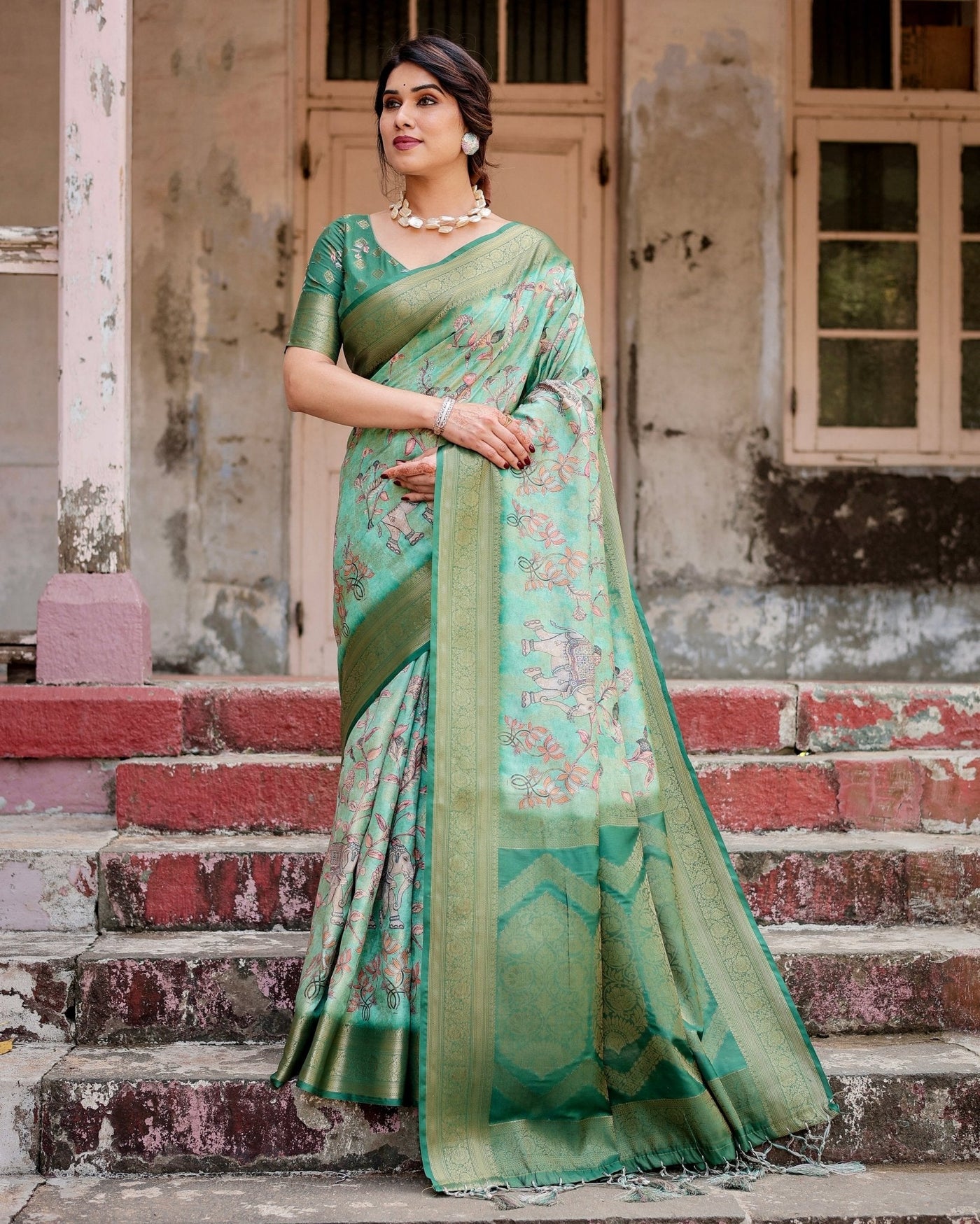 Graceful Green Banarasi Silk Saree with Intricate Floral and Elephant Weaves