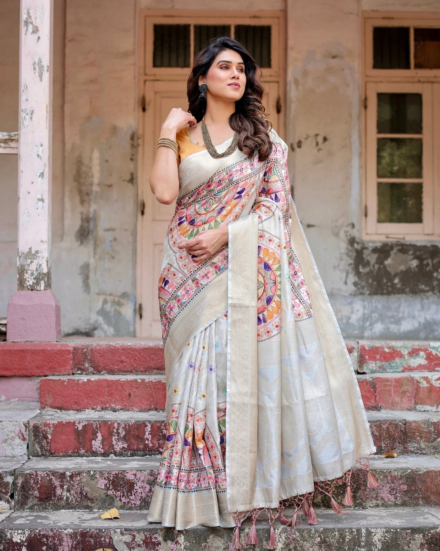 Off-White and Multicolor Mandala Design Banarasi Silk Saree with Zari Weave and Tassel-Adorned Pallu