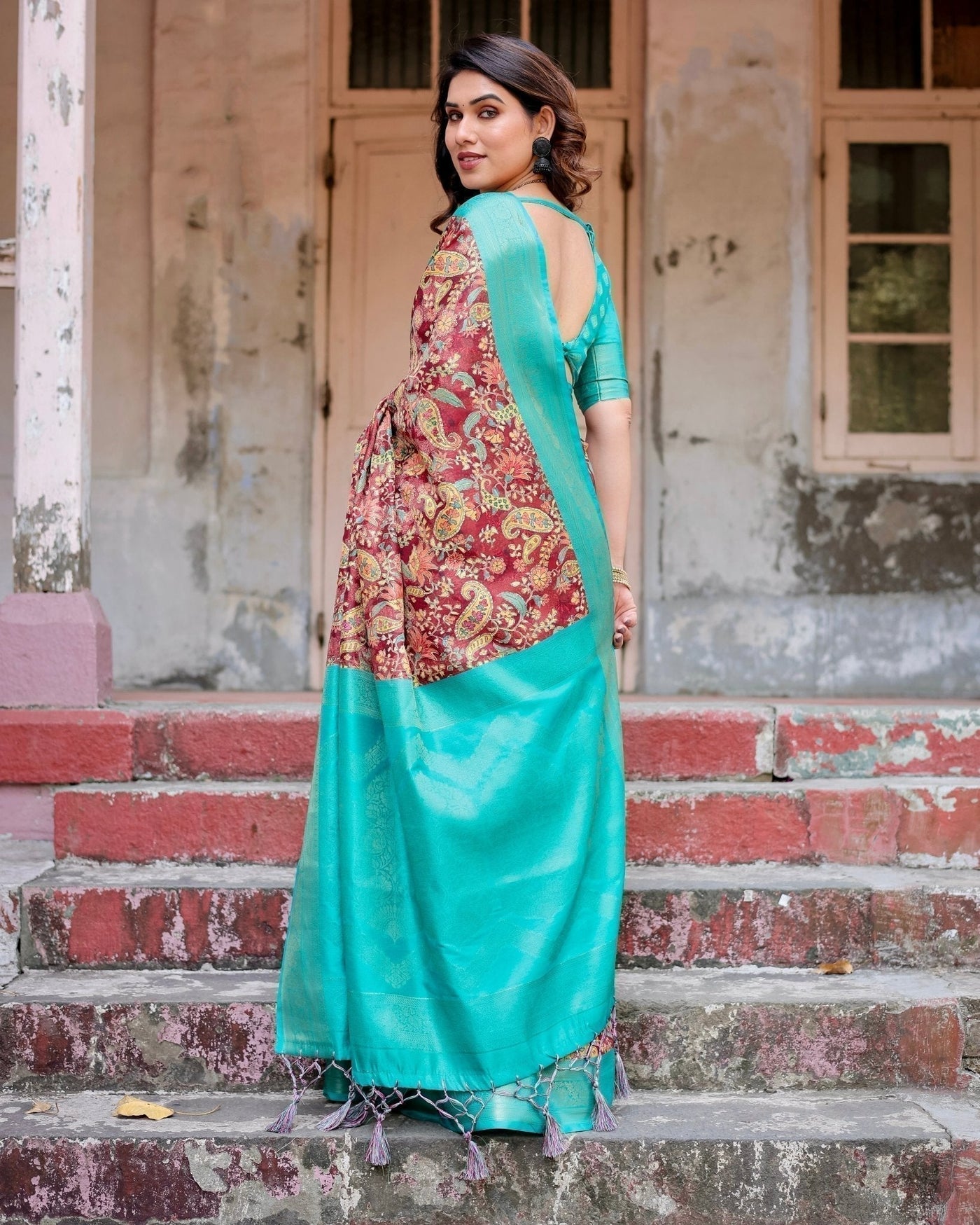 Maroon and Teal Paisley Design Banarasi Silk Saree with Zari Weave and Tassel-Embellished Pallu