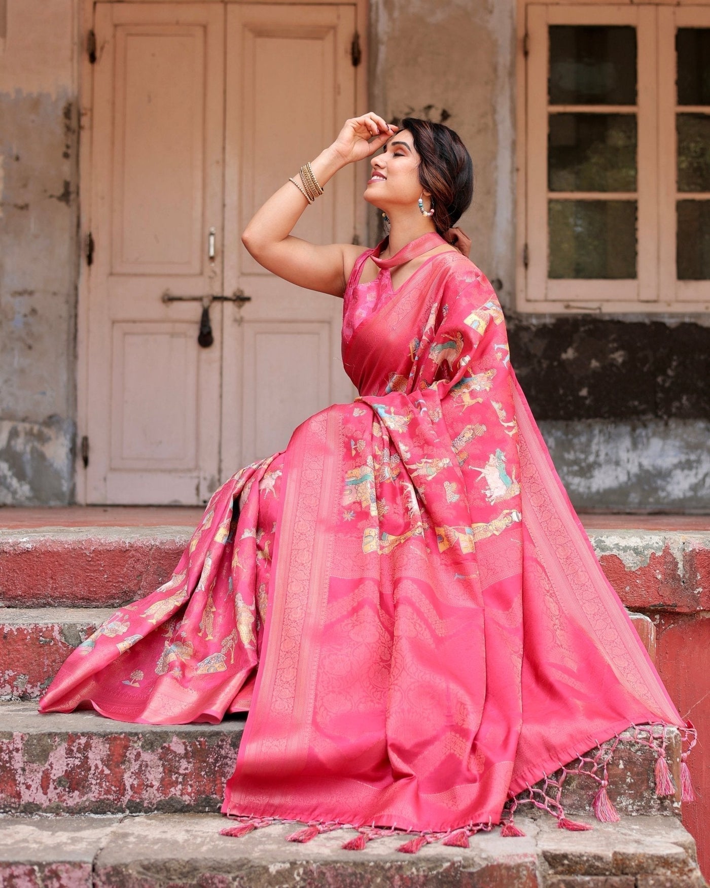 Regal Pink Banarasi Silk Saree with Zari Weave and Intricate Tassels