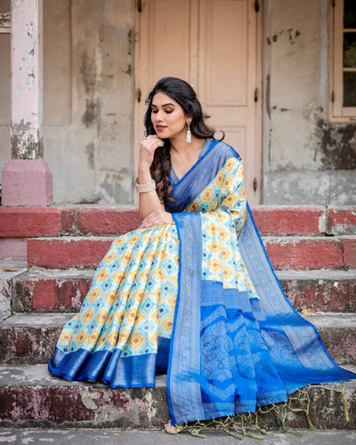 Yellow and Blue Ikat Digital Print Banarasi Silk Saree with Zari Weave and Tassel-Embellished Pallu