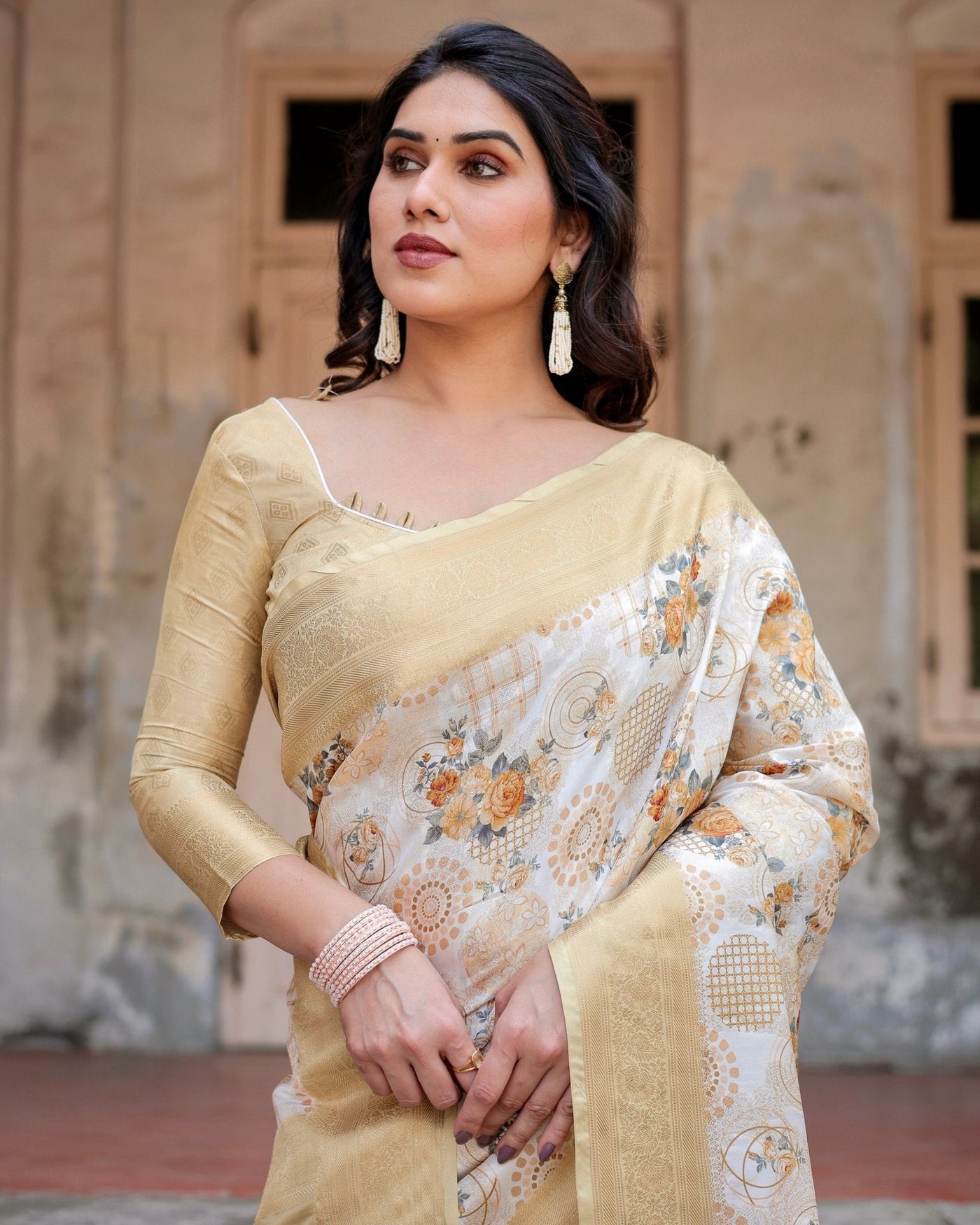 Ivory and Gold Banarasi Silk Saree with Floral Print, Zari Border, and Tassels