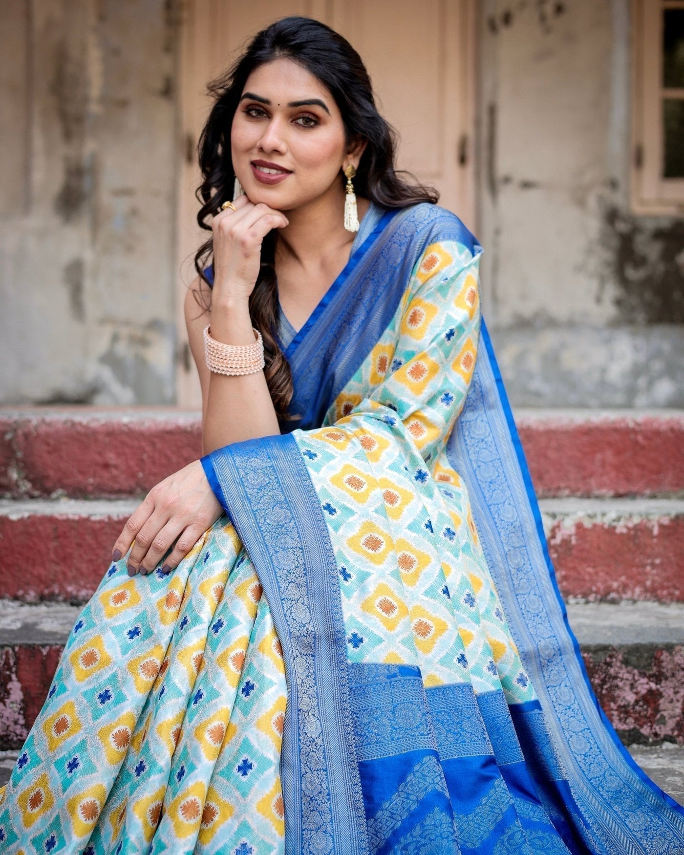 Yellow and Blue Ikat Digital Print Banarasi Silk Saree with Zari Weave and Tassel-Embellished Pallu