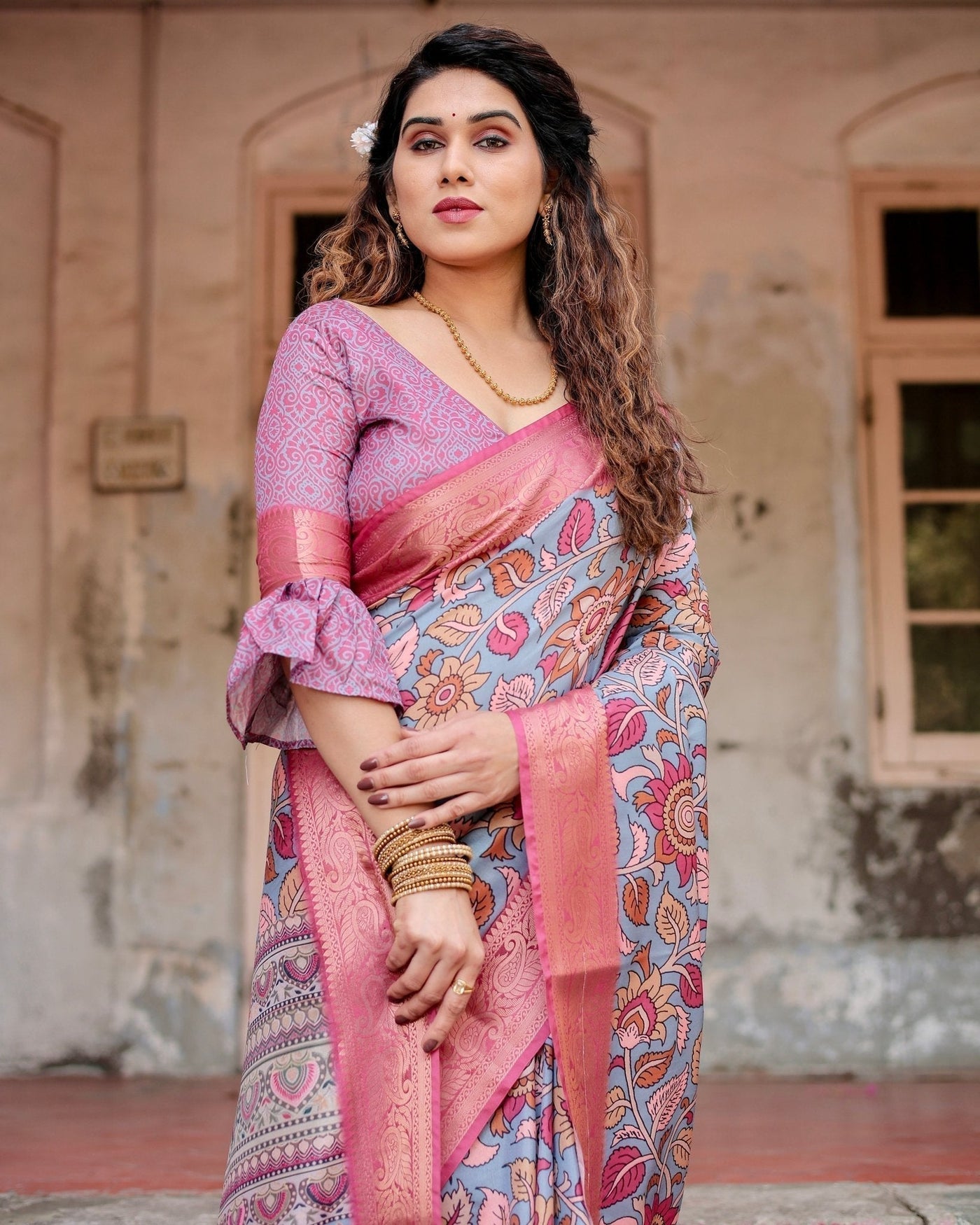 Graceful Grey Tussar Silk Saree with Pink Zari Border and Intricate Floral Motifs