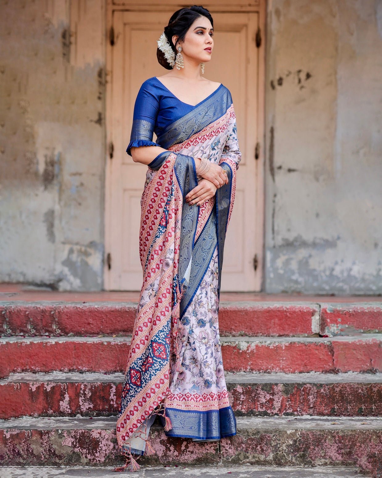 Ivory and Navy Blue Tussar Silk Saree with Floral Elegance and Ornamental Zari Work
